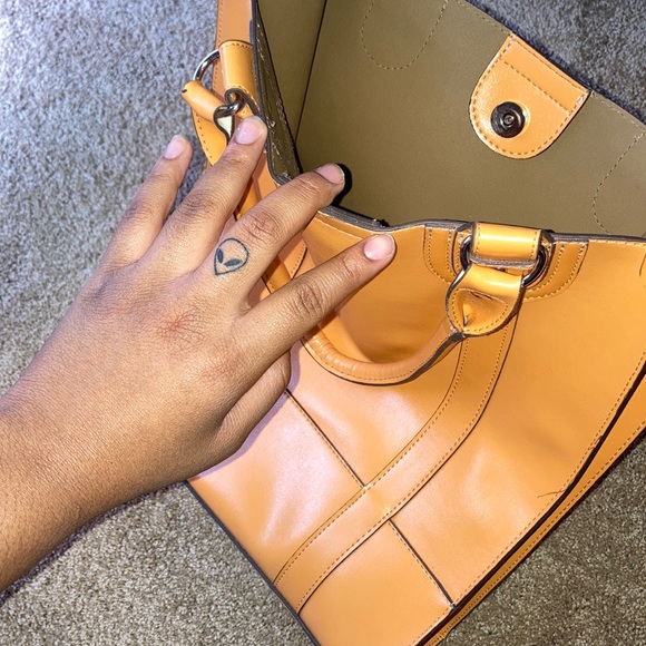 Emillie M. Purse,buckle to close.Mini pouch inside - Picture 2 of 3